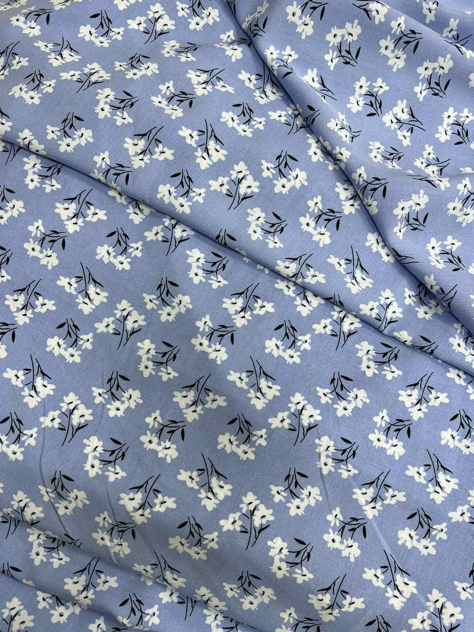 ТКАНИНА ШТАПЕЛЬ БІЛА, МІЛКА КВІТОЧКА НА БЛАКИТНОМУ ФОНІ, фото 1