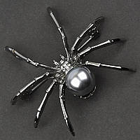 Брошь металлическая на серебристой основе паук с белыми кристаллами и серой бусиной размер 55х55 мм