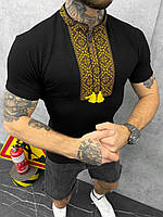 Чоловіча вишиванка футболка чорна з коротким рукавом літня з жовтим орнаментом на грудях