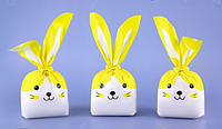 Пакети дитячі поліетиленові з вушками жовте зайченя, подарункові пакети з малюнком для солодощів 21х13 см 10 шт