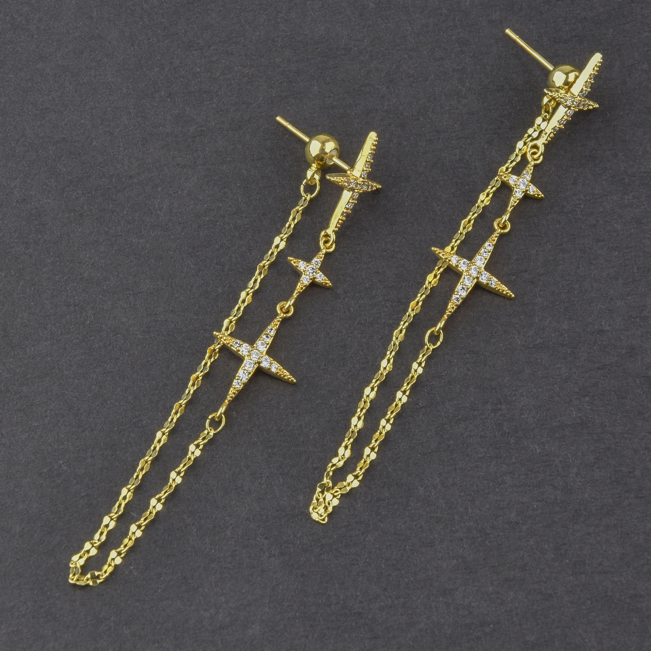 Сережки застібка гвоздик металеві золотисті подвійні ланцюжки зірочки з кристалами довжини 6 см 925 S