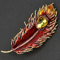 Брошка металева на золотистій основі пір'їнка зелена зі стразиком покрита кольоровою емаллю розмір 35х75 мм