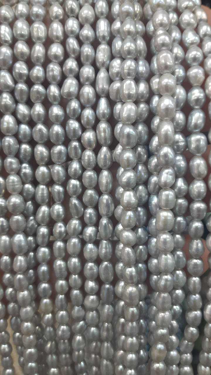 

Бусины Жемчуг рис на нитке d-4х6мм(+-) L-38см
