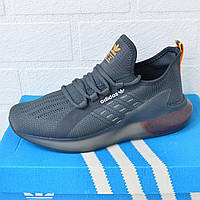 Модные мужские кроссовки Адидас ЗХ Буст. Серая мужская обувь с оранжевыми деталями Adidas ZX Boost.