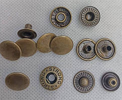 Кнопка "Альфа", колір — антик (бронза).
Діаметр — 15 мм. STRONG. Паковання — 720 шт.