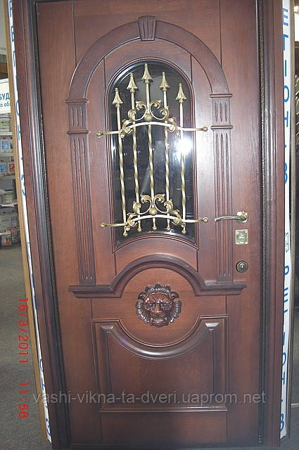 Двері вхідні металеві з дубовими накладками і склопакетом - фото 10 - id-p2256098