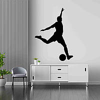 Вінілова інтер'єрна наклейка декор на стіну та шпалери для хлопчика "Футбол. Футболіст відбиває м'яч" з оракалу
