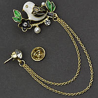 Брошка гвоздик металева на золотистій основі пташка з ланцюжком покрита кольоровою емаллю розмір 35х30 мм