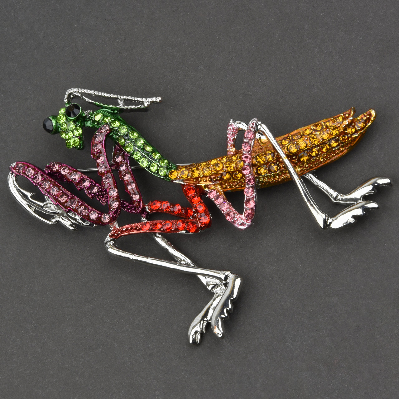 Брошка металева на сріблястій основі масивний 741 з різнобарвними кристалами розмір 75х80 мм