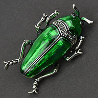 Брошка металева на сріблястій основі жук із сірими камінцями покрита кольоровою емаллю розмір 50х25 мм