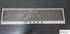 Рамка номерного знаку з написом та логотипом "Mazda"