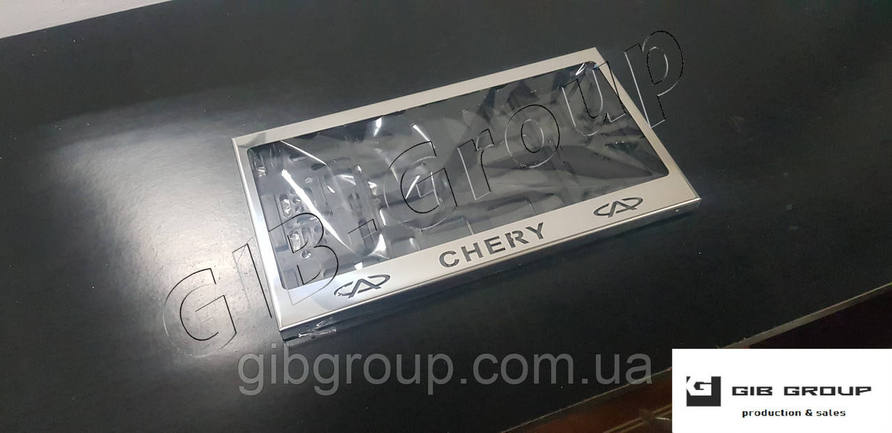 Рамка номерного знаку США ( Chery + логотип ) Метал нержавіюча сталь