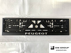 Рамка номерного знаку з написом і логотипом Peugeot чорна - напис білого кольору