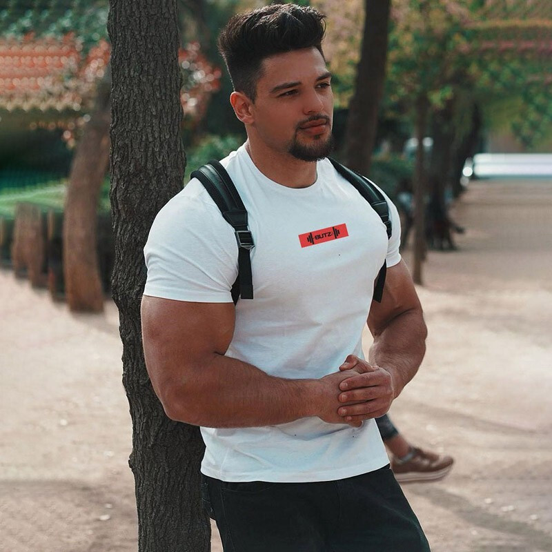 Спортивна чоловіча футболка від бренду BUTZ білого кольору, фото 1