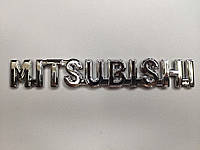 Эмблема - надпись MITSUBISHI 150*20 мм. Логотип на крышку багажника хромированный.