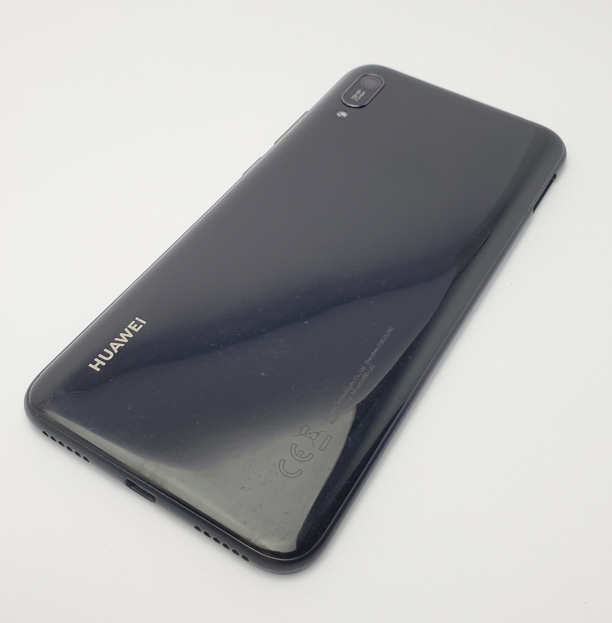 Із дефектом. кришка huawei y6 2019 (mrd-lx1) чорна оригінал з розборки