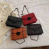 Сумка із заклепками