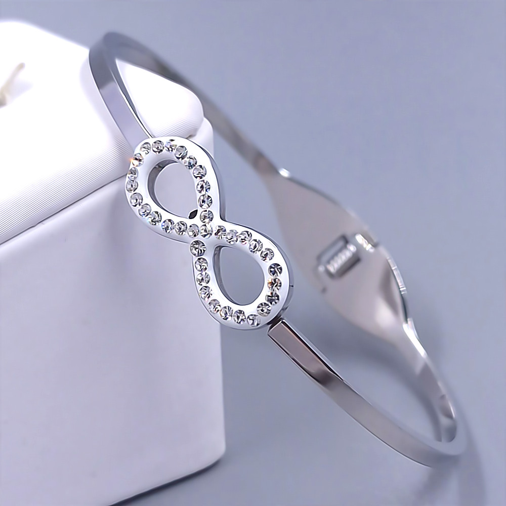 Жорсткий браслет Stainless Steel. Сталь. Родій. Діаметр: 63 мм. Ширина: 11 мм.