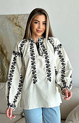 Вишиванка молочного кольору з сучасною чорною оригінальною вишивкою