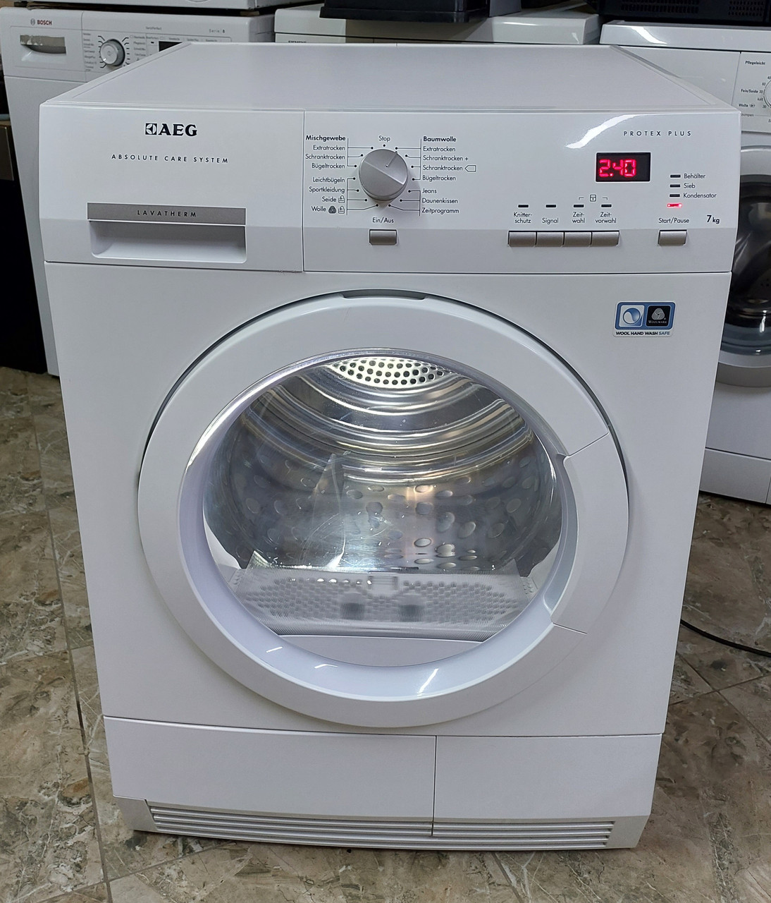 Сушильна машина AEG T66770IH4 на 7кг тепловий насос 900Вт вживана б/в