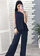 Літній жіночий брючний костюм із широкими вільними штанами
