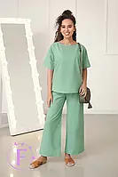 Жіночий брючний костюм на літо з льону