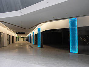 Облицовка колонн стеклом с подсветкой, с нанесением трехцветного рисунка. ТРЦ "Проспект", г. Киев