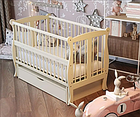 Кроватка для новорожденных с механизмом укачивания, откидным бортиком и ящиком "Грация" BabyRoom Слоновая кость