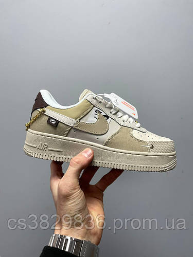 Nike air force 1 tan junior 2025