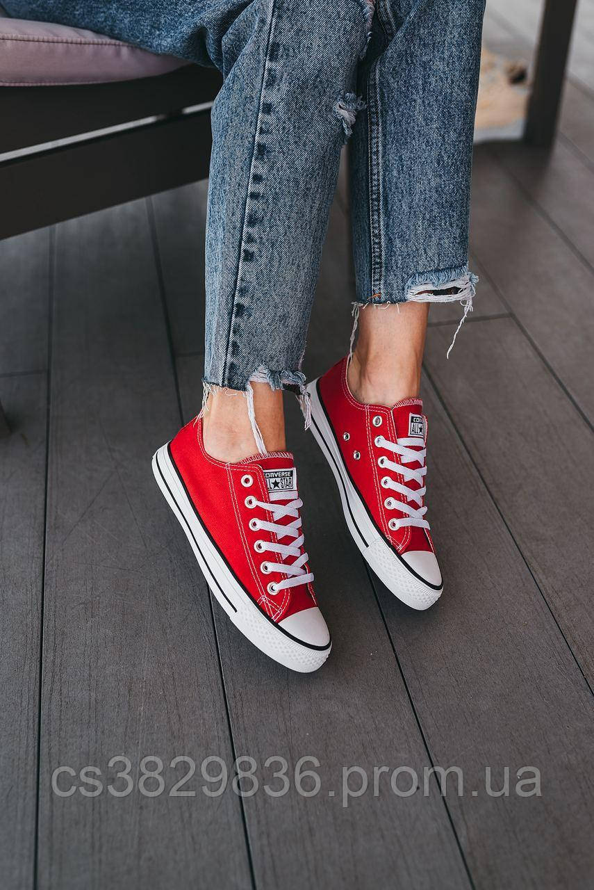 White low top best sale converse with black stripe