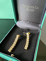 Tiffany / Тиффани вечерние серьги "дорожка" с цирконием, позолота AU 750. Подарочная упаковка Тиффани премиум