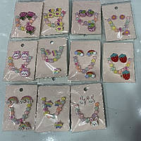 Набір дитячої біжутерії пласт арт. B4320 (200шт) мікс різновидів, браслет, кільце, кліпси пакет см