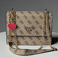 Золотистая женская сумка Guess Mini Bag