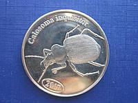 Монета 500 рупий северная Суматра 2017 фауна насекомые жуки красотел бронзовый
