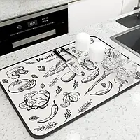 Антиковзний килимок для сушіння посуду відрізняється міцністю та швидким поглинанням вологи овочі