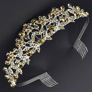 Корона діадема висота 4 см металева з гребінцями сріблястого кольору з квіточки з жовтими камінчиками