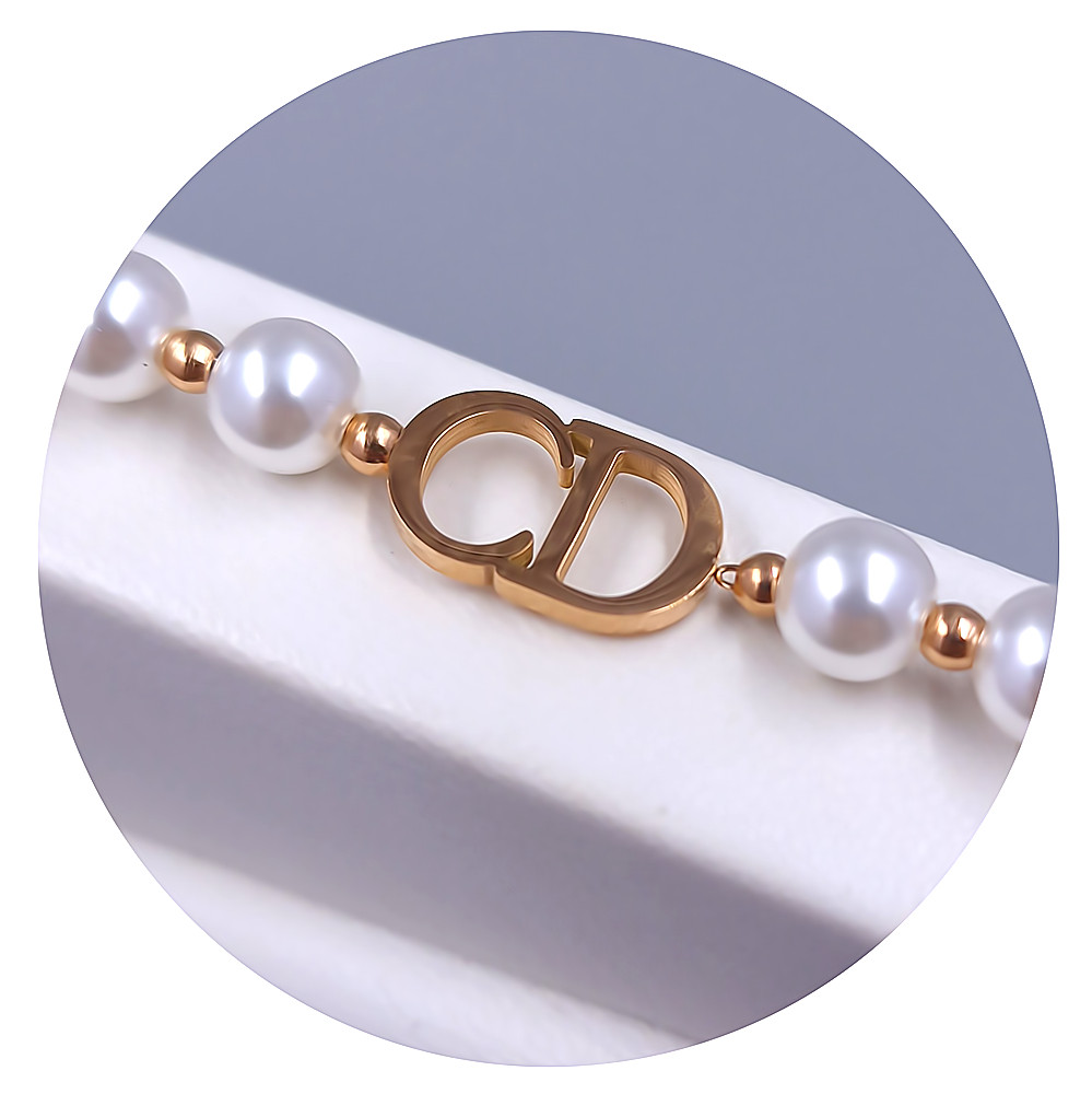 Браслет Stainless Steel. Сталь. Позолота ЧВ. Камені: білі перли. Довжина: 17-20.5 см