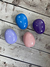 Масажна щітка яйце в коробці