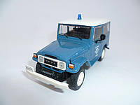 Полицейские машины мира №18, Toyota Land Cruiser Полиция Греции (1970) Коллекционная Модель в Масштабе 1:43