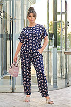 Літній жіночий костюм Балі синій з бежевими квітами (52-66)