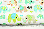 Лоскуток. Бавовняна тканина з слониками м'ятно-салатових і бежевих відтінків на білому, 95*160 см, фото 7