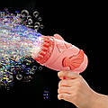 Детская игрушка пистолет для мыльных пузырей на батарейках, игрушка для пускания мыльных пузырей розовая