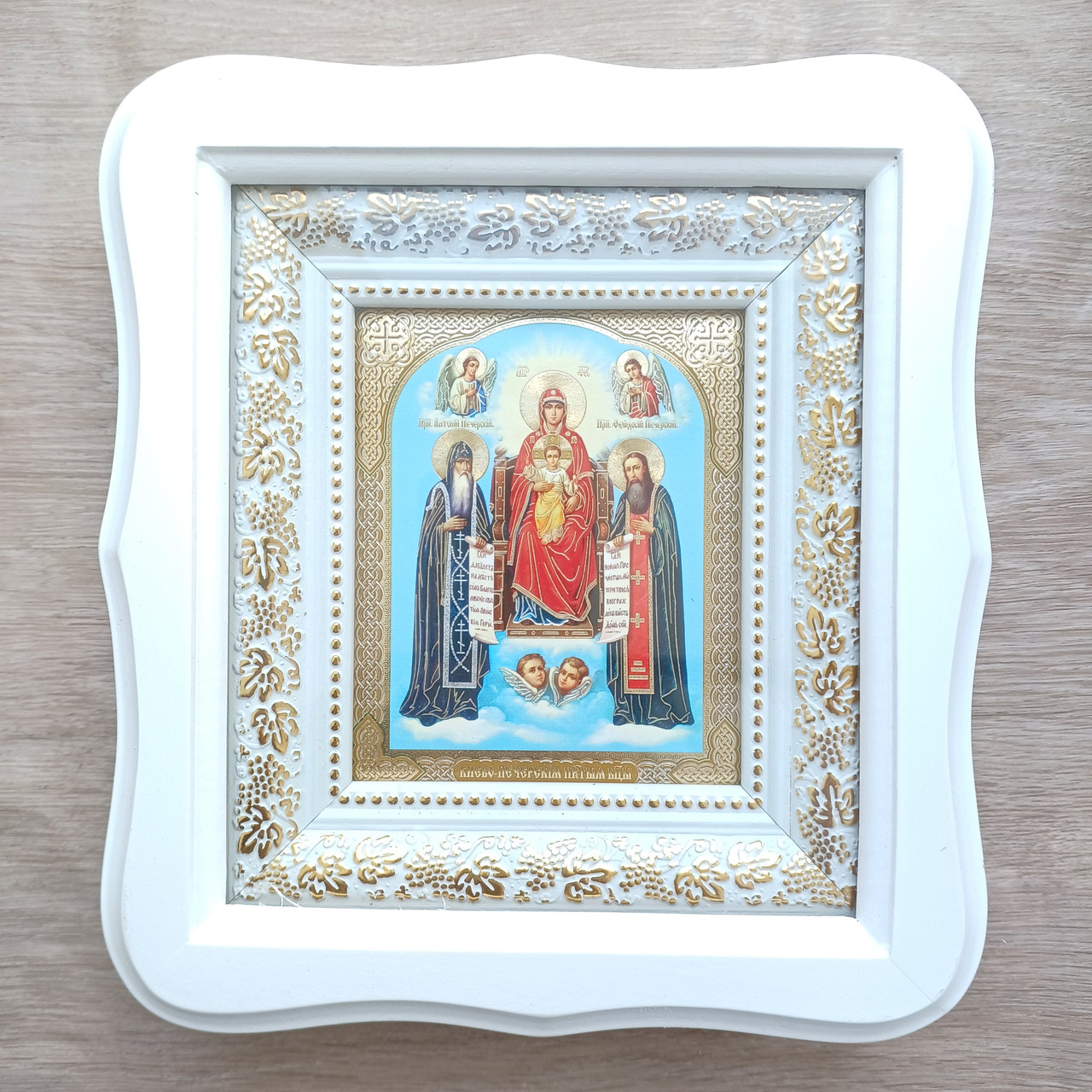 Ікона Києво-Печерська Пресвята Богородиця, лик 10х12 см, у білому фігурному дерев'яному кіоті