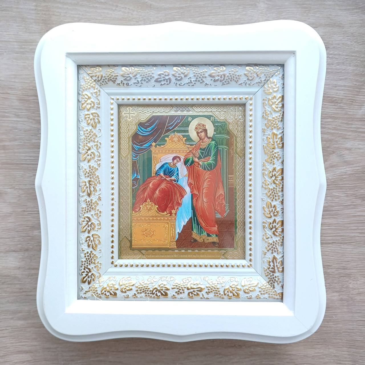 Ікона Цілительниця Пресвята Богородиця, лик 10х12 см, у білому фігурному дерев'яному кіоті