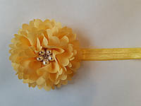 Желтая детская повязка с цветком - окружность 40-50см, диаметр цветка 9см