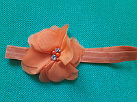 Дитяча пов'язка з квіткою помаранчева - розмір квітки 6,5 см, розмір універсальний (на резинці)