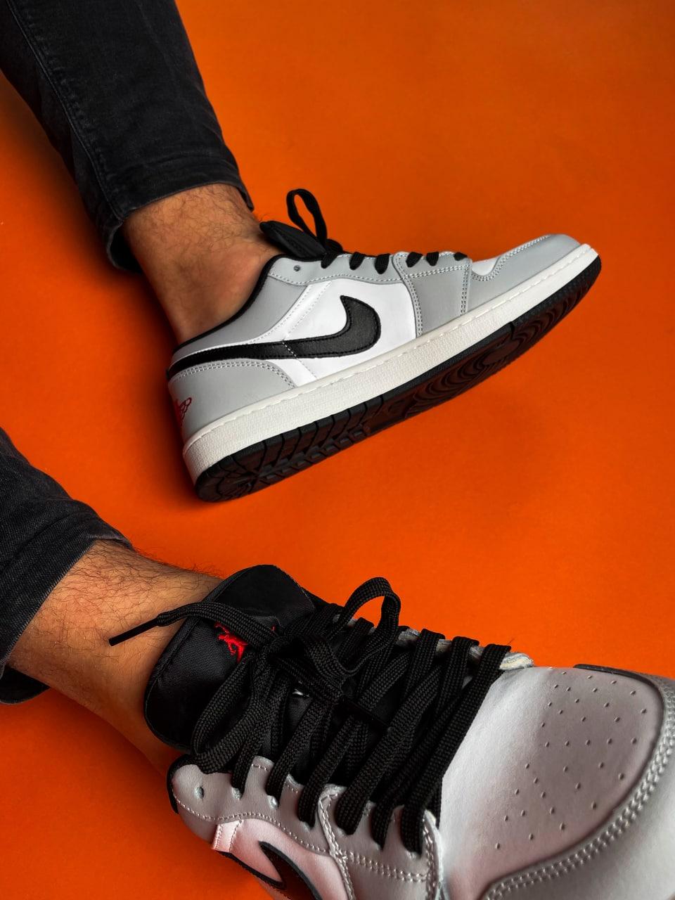 Jordan retro 1 hotsell grey and white