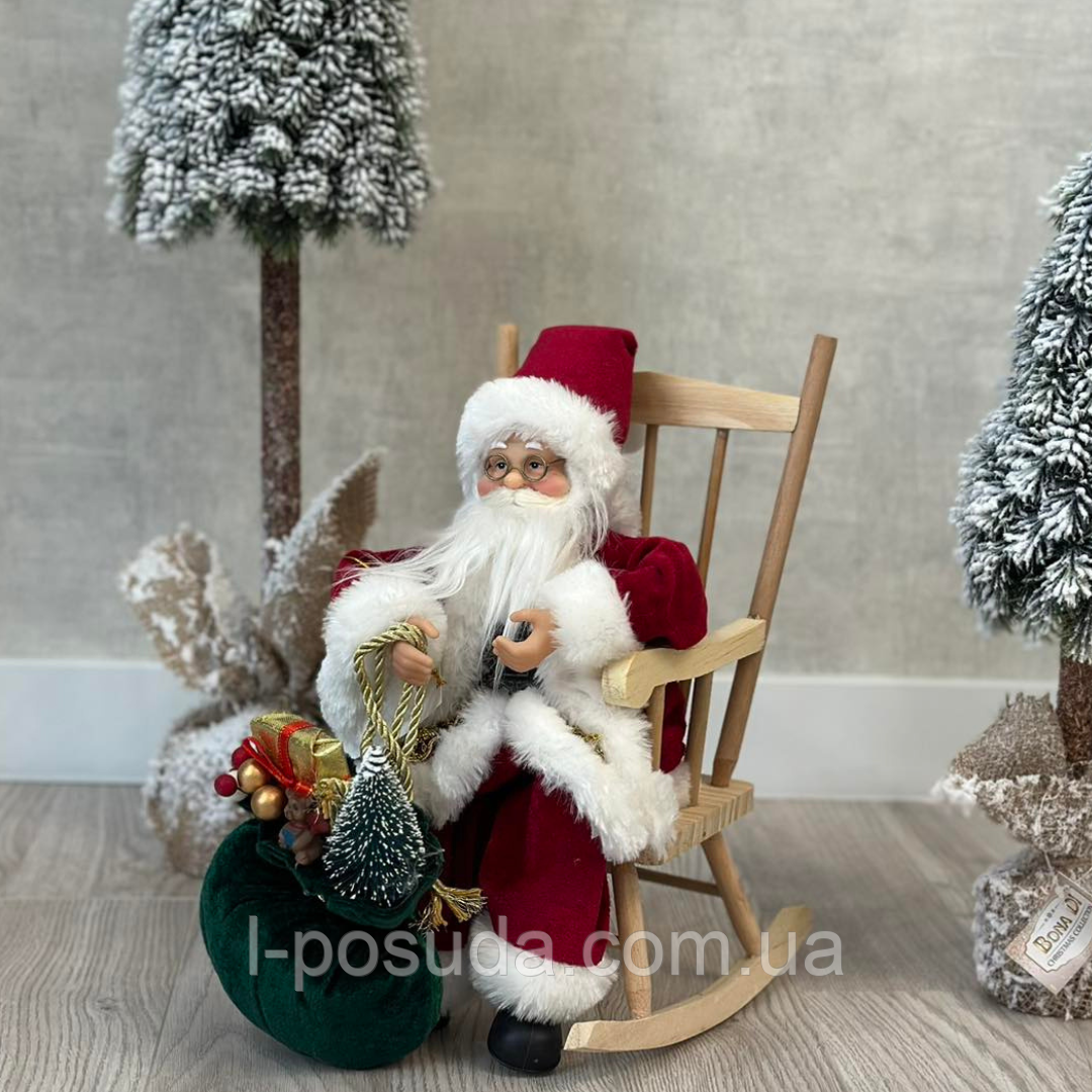 Санта у кріслі качалці 30*20 см фігурка під ялинку для новорічного декору