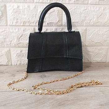 Жіночі сумочки та клатчі