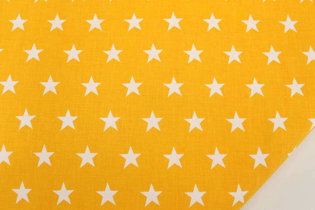 Бязь в білі зірки 2 см на жовто-помаранчевому тлі №117